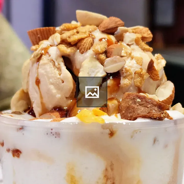 Bowl of ice cream with toppings