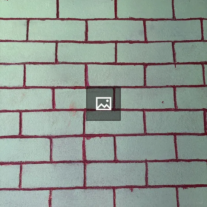 Textured wall with green bricks