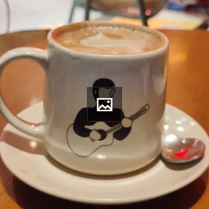 Cappuccino in a White Cup