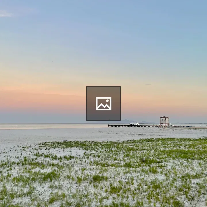 Wide beach at sunset