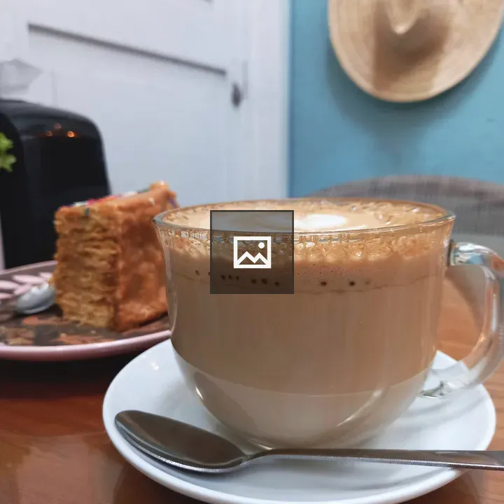 Latte in Glass Cup with Cake