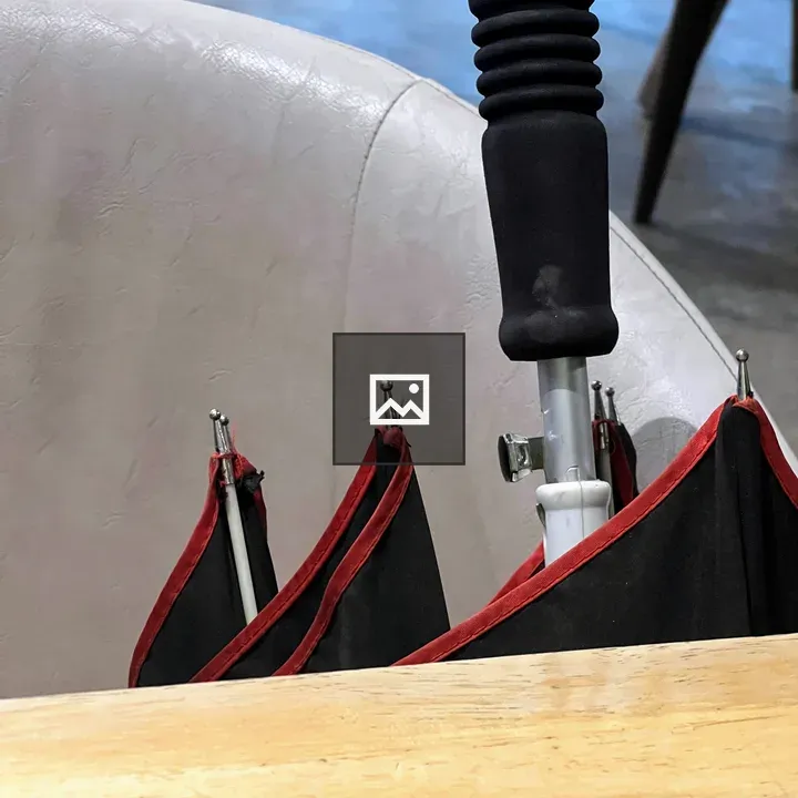Umbrella close-up with red trim