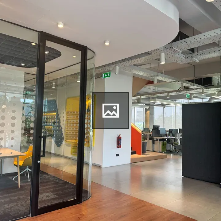 Modern office with glass-walled meeting room