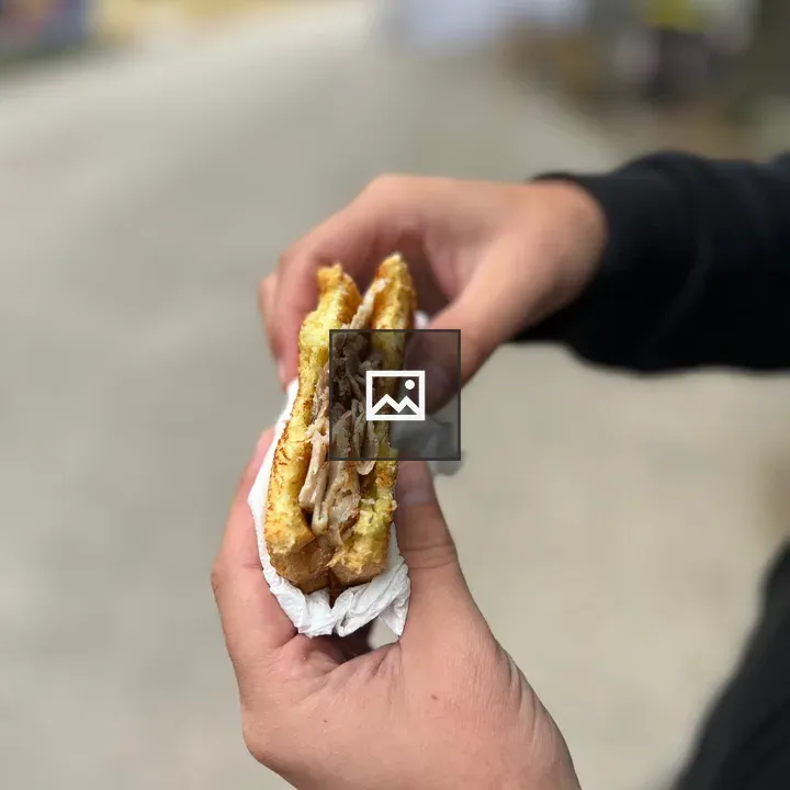 Street food sandwich in foreground
