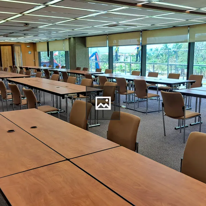 Spacious conference room with tables