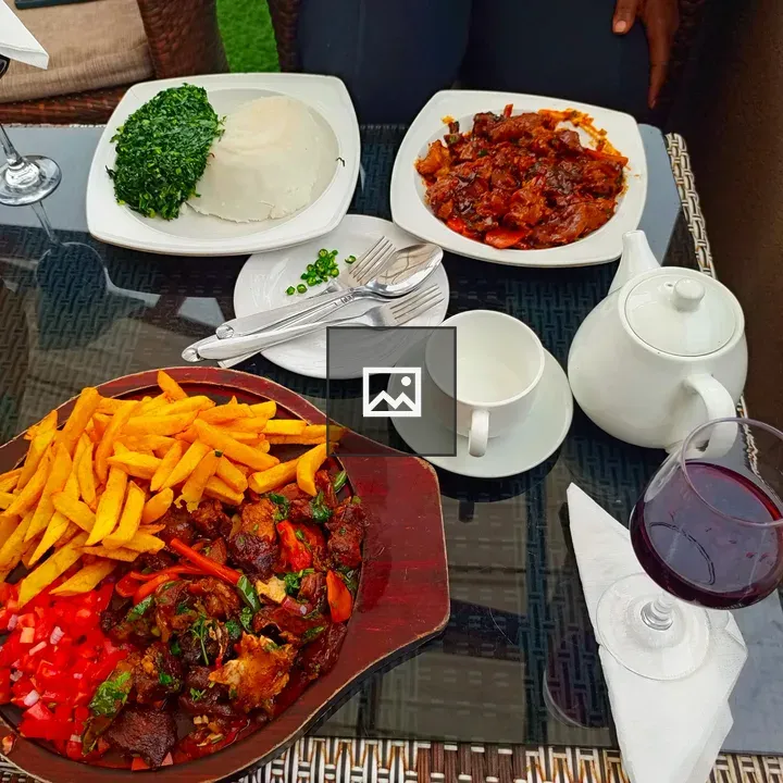 Glass table meal with various dishes