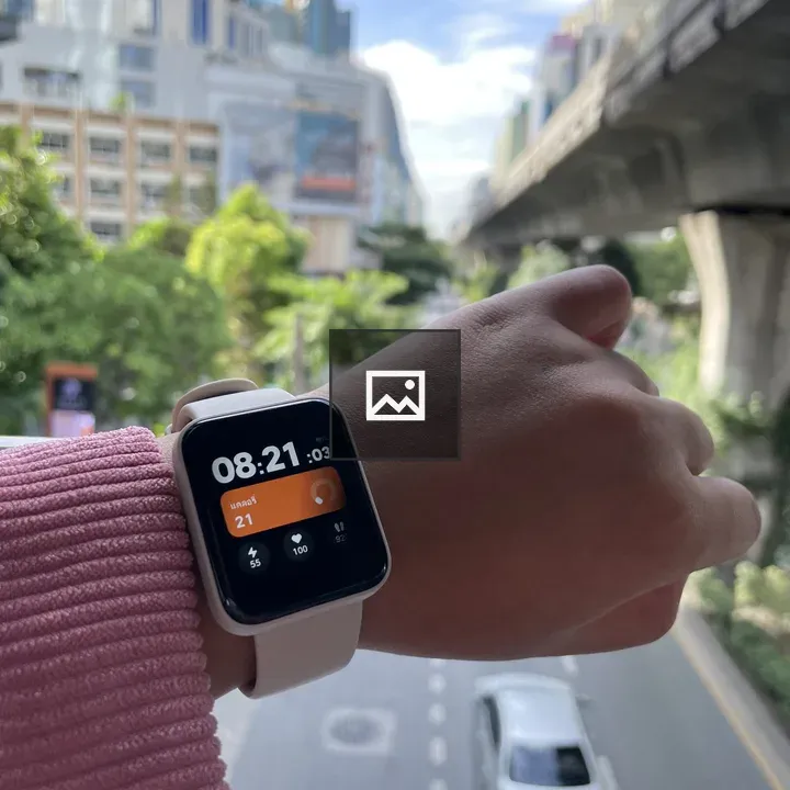 Smartwatch on Wrist with Time and Metrics