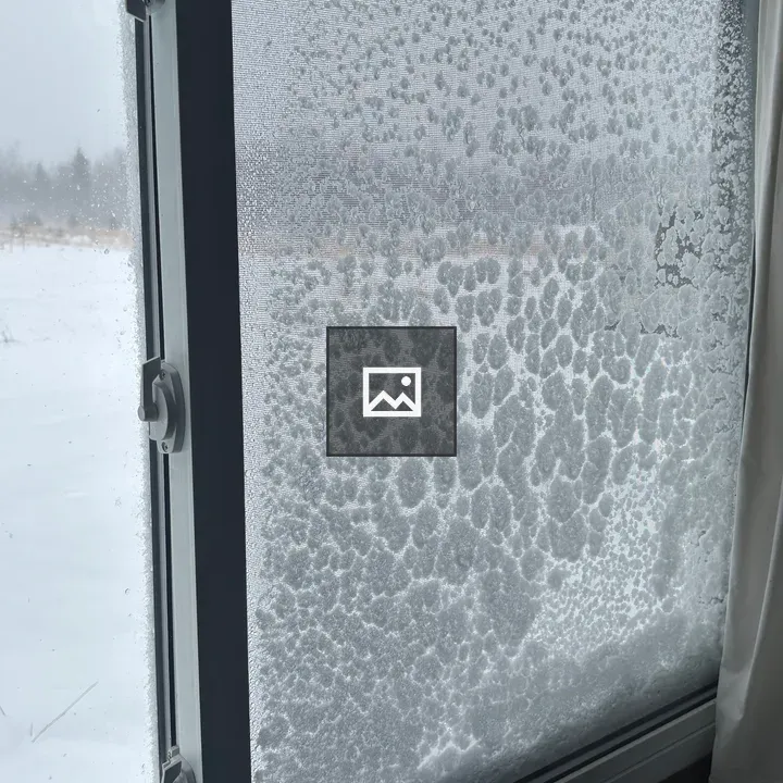 Window with snow and ice