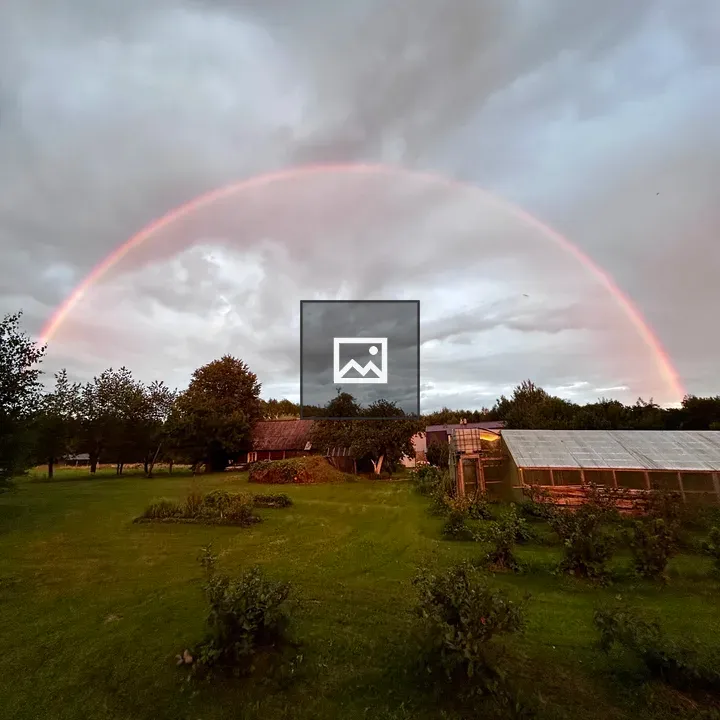 Rainbow Over Green Countryside