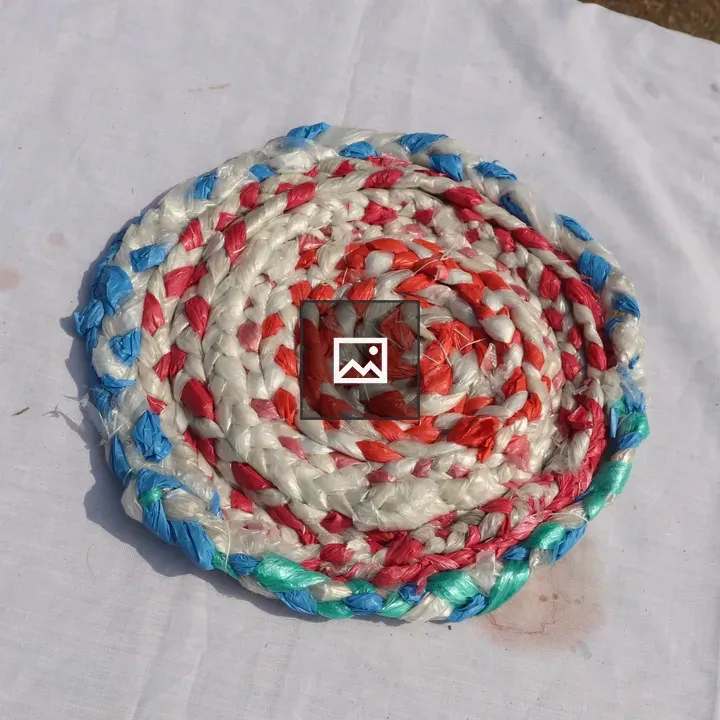 Braided circular mat with color spiral