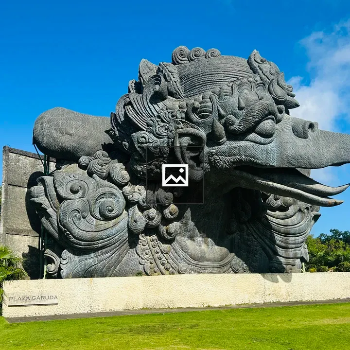 Carved stone statue of mythical bird