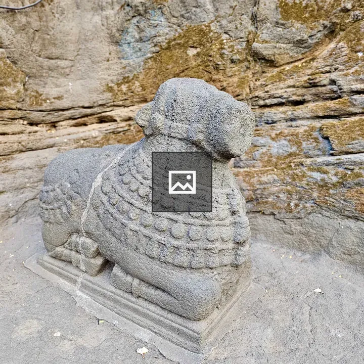 Nandi statue at Pataleshwar Cave Temple