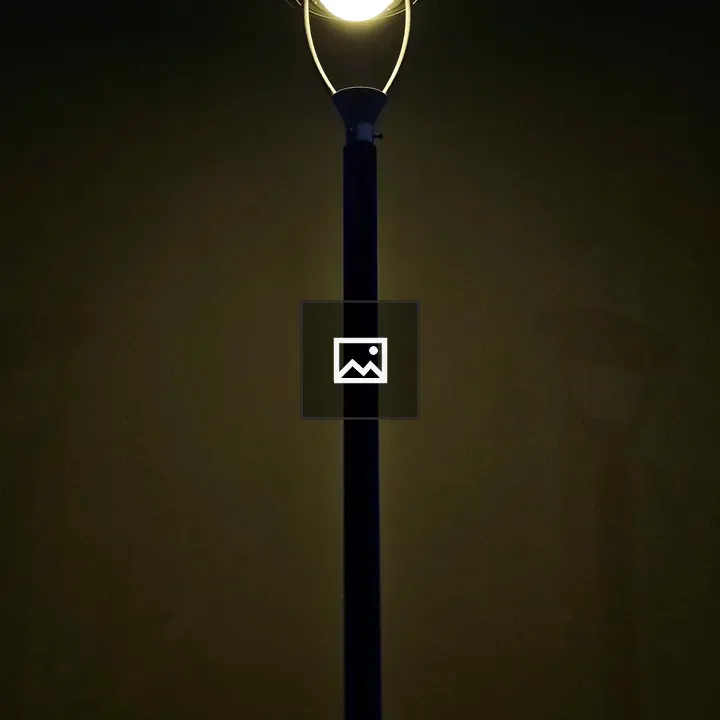 Tall street lamp at night