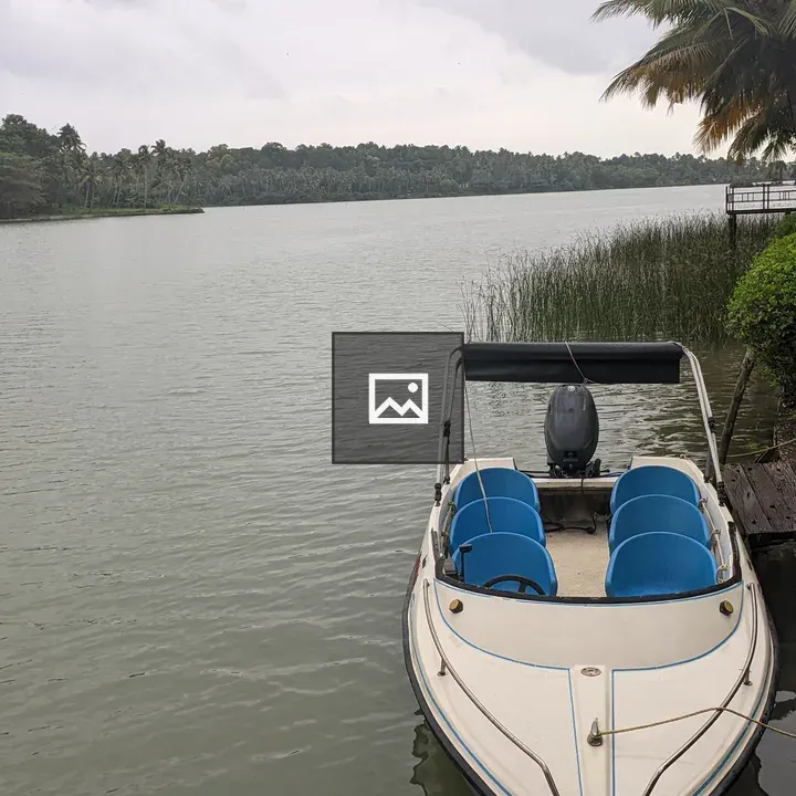 Speedboat on River Bank