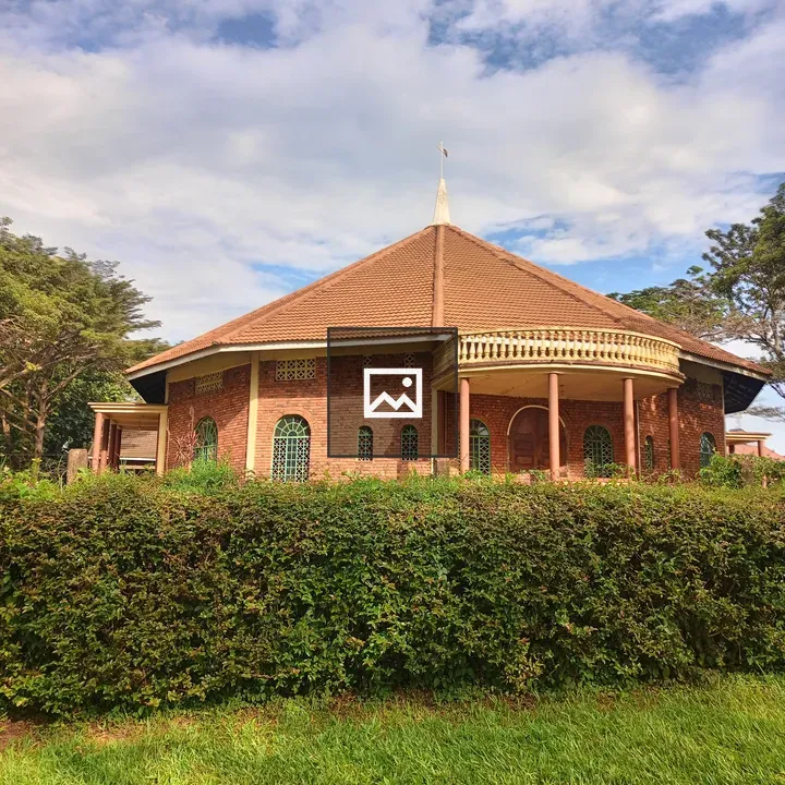 Brick church with hedge