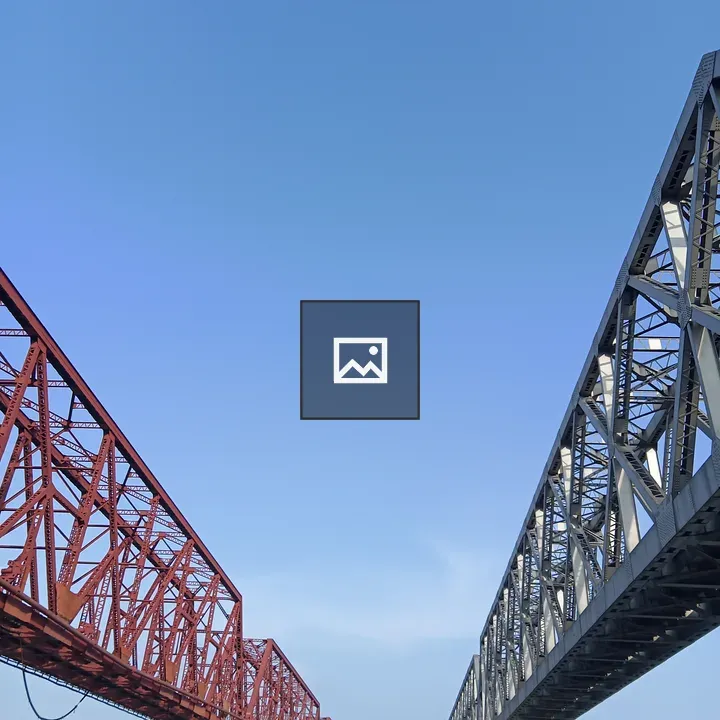 Two lattice bridges over river