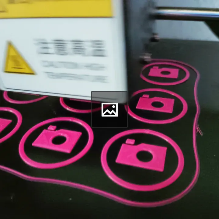 3D printer badges in pink