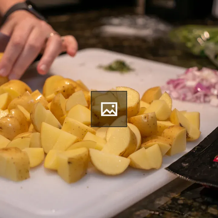 Potatoes chopped in kitchen