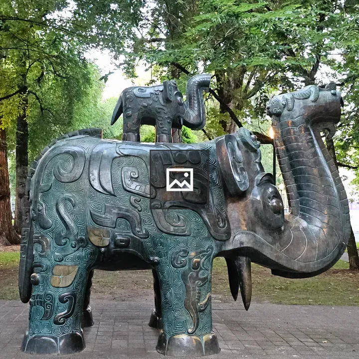 Bronze elephant statue in park
