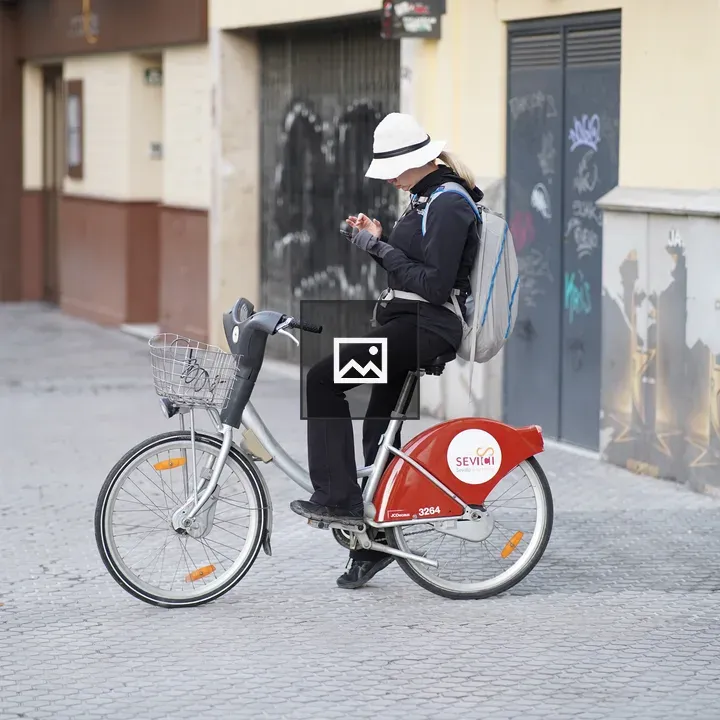 Tourist on public bicycle