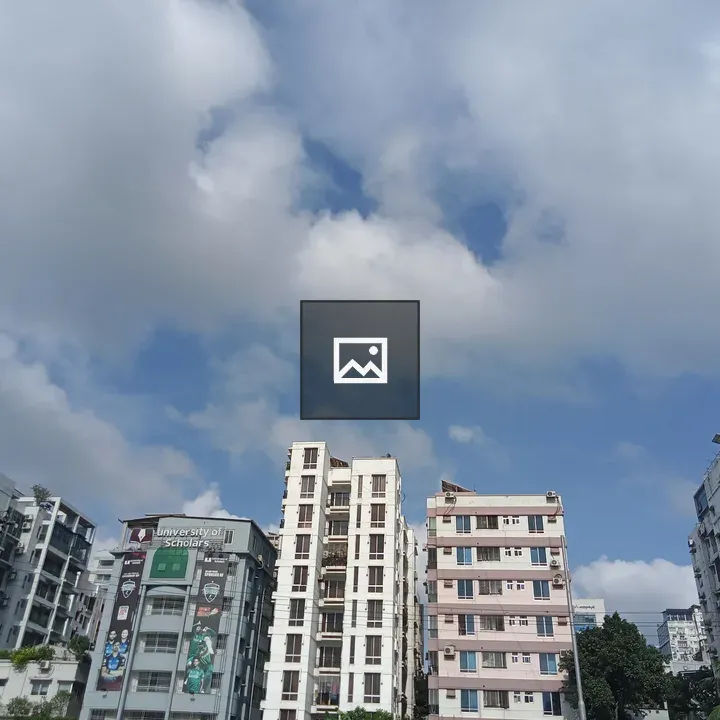 Apartments under a cloudy sky