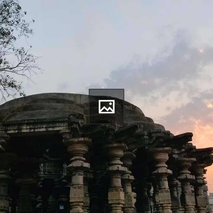 Ancient stone temple at sunset
