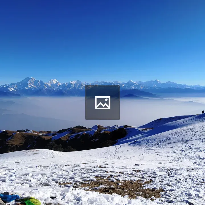 Blue Sky Over Snowy Mountains