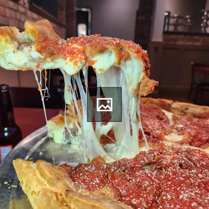 Cheesy deep dish pizza