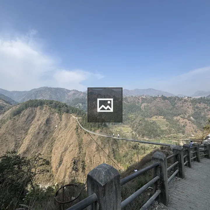Aerial View of Terraced Hills and Road