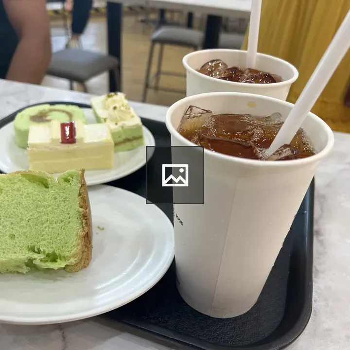 Tray of Iced Teas and Cakes
