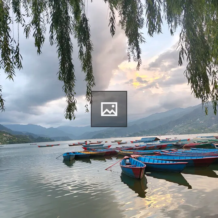 Sunset Boats on a Calm Lake