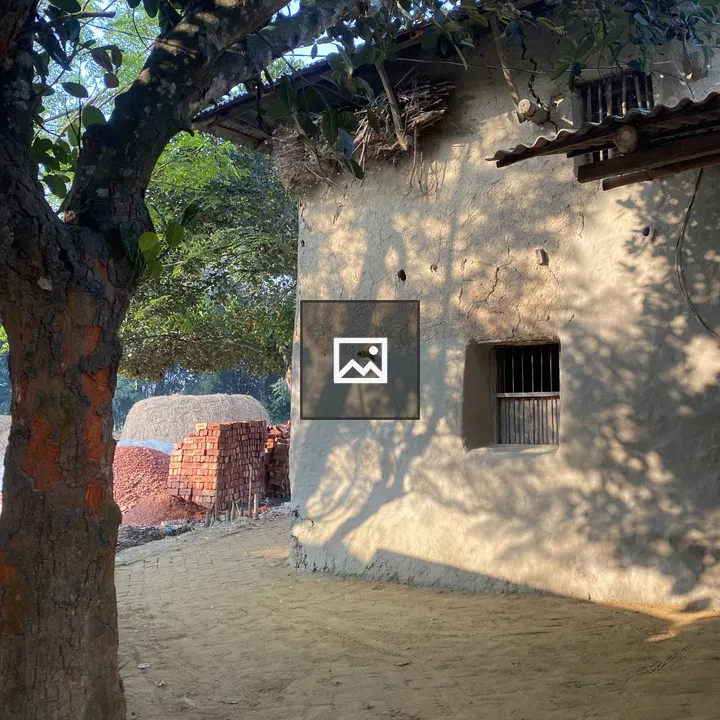 Mud House Wall with Tile Roof