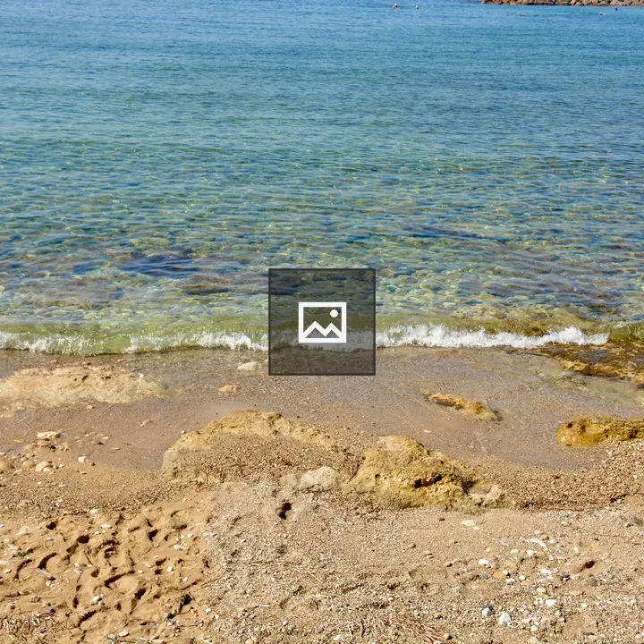 Beach in Paphos with pebbled shore