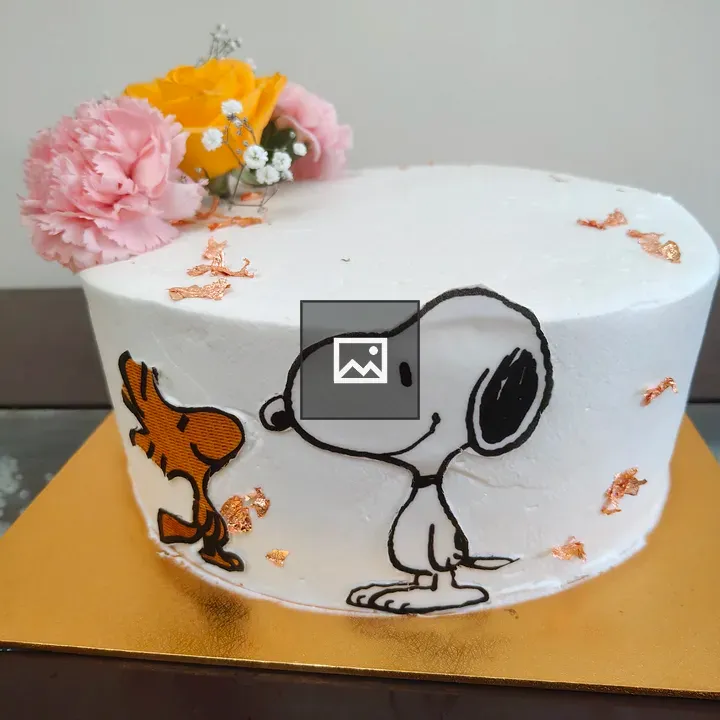 Cake with Snoopy and Woodstock design
