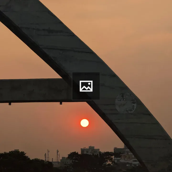 Sunset over concrete arch