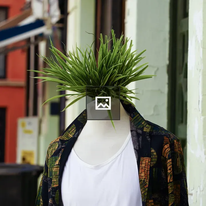 Mannequin with Grass Tuft