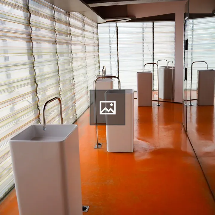 Indoor public space sinks and orange floor