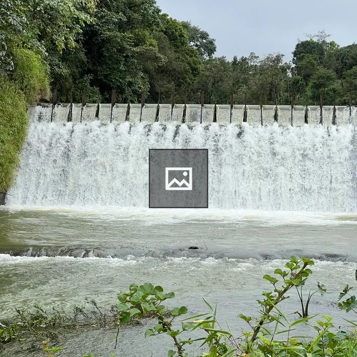 Dam with Curtain-Like Waterfall