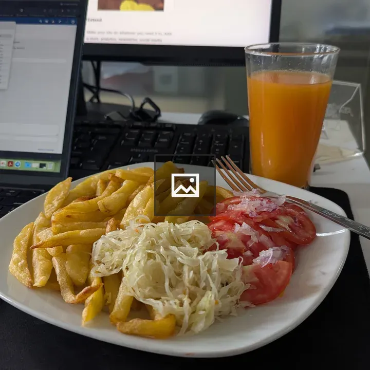 Plate with fried potatoes and cabbage