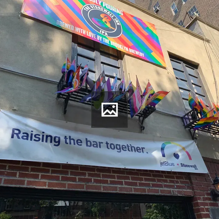 Stonewall Inn exterior with pride flags