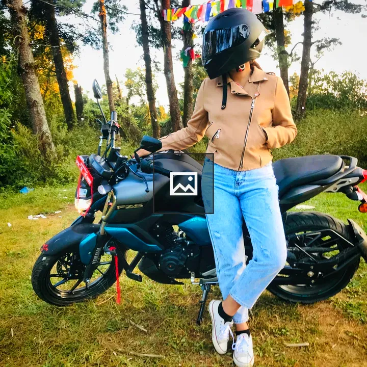 Lady rider by motorcycle