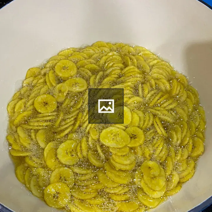 Banana chips being fried