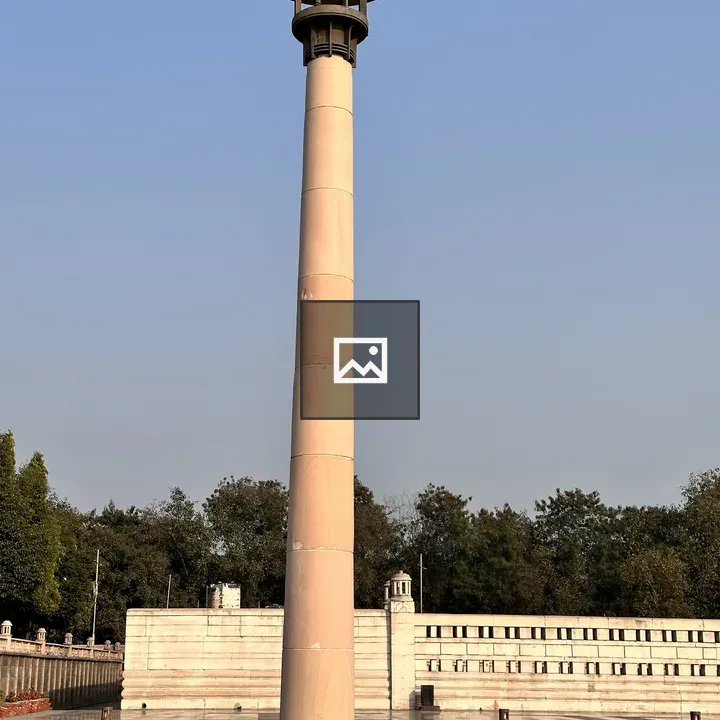 Towered pillar against clear sky