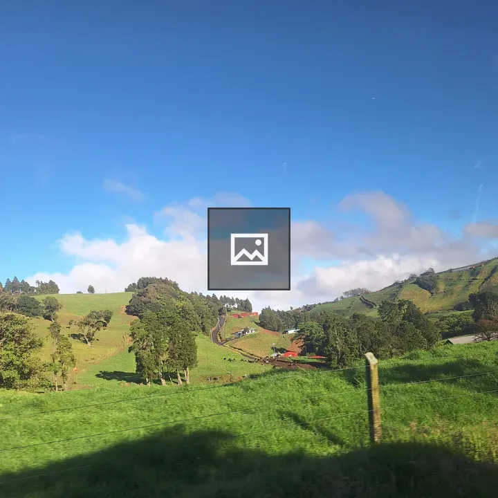 Green Landscape Under Blue Sky