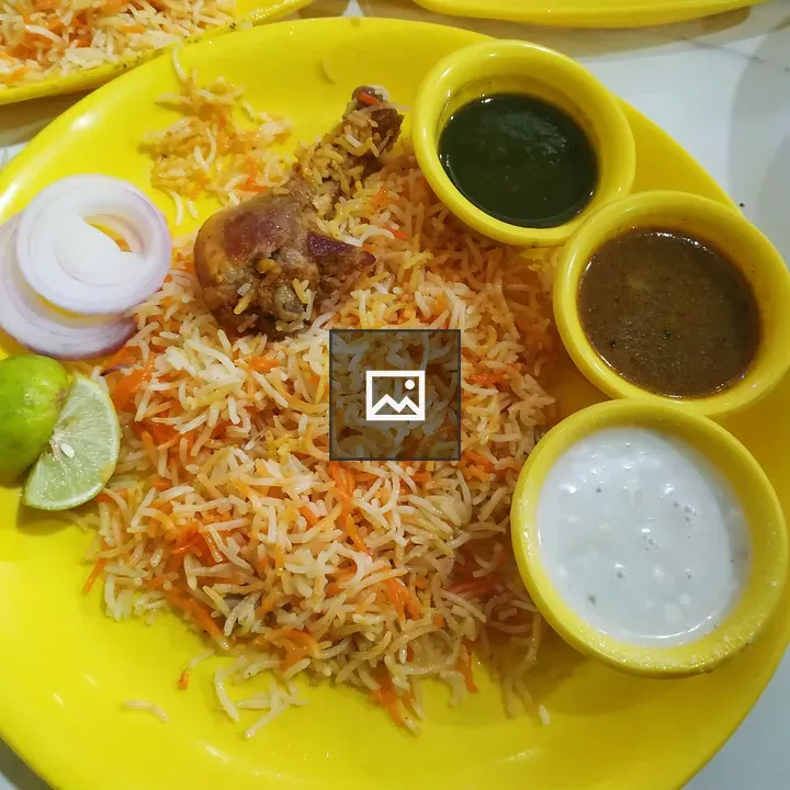 Delicious Biryani on Yellow Plate