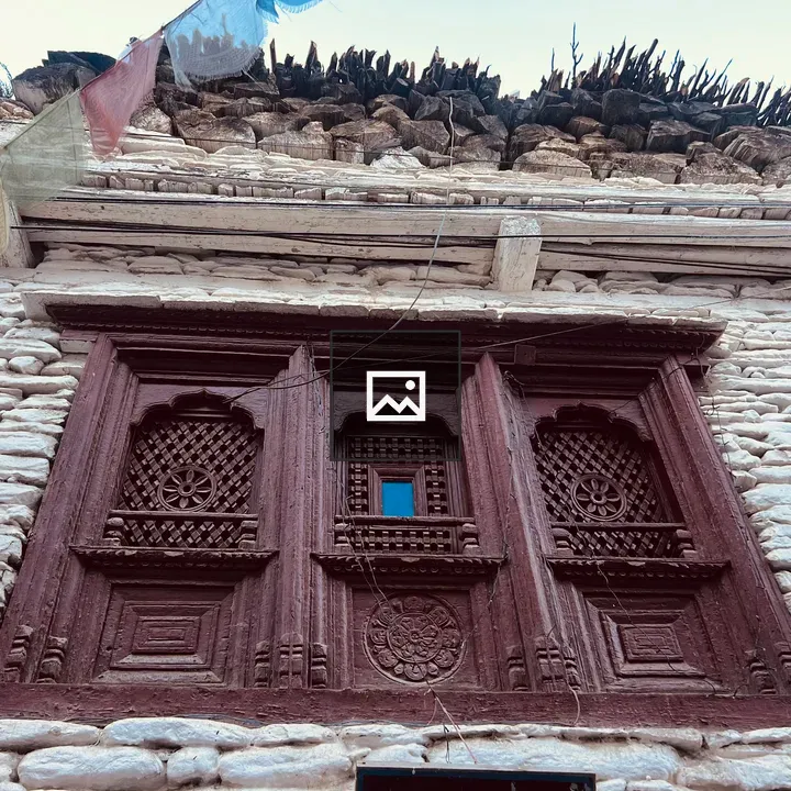 White Stone Building with Carved Windows