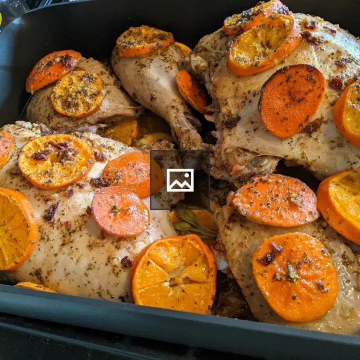Baked turkey with orange slices