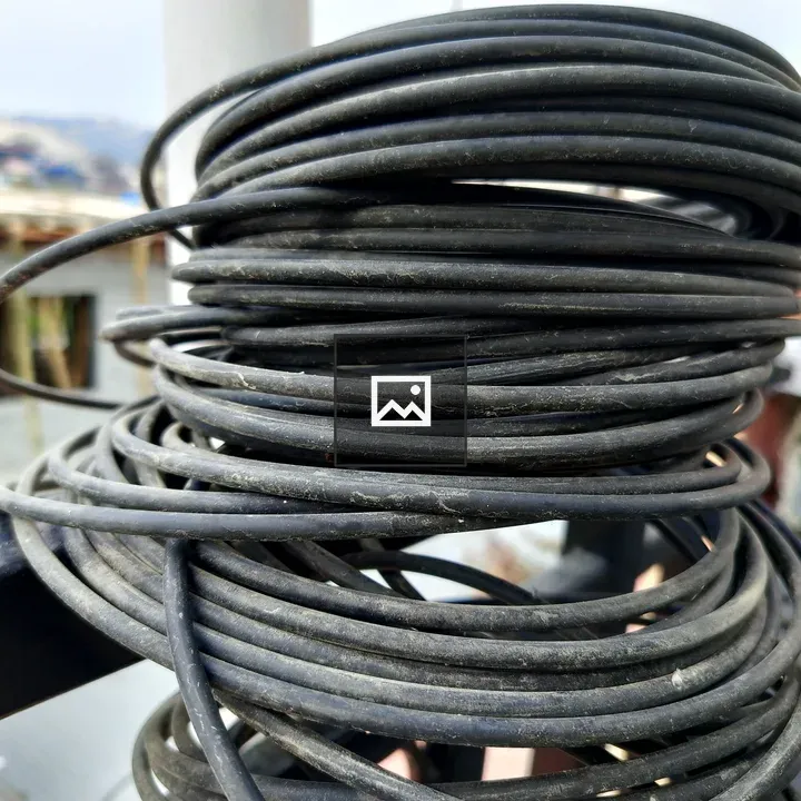 Tangled pile of black wire