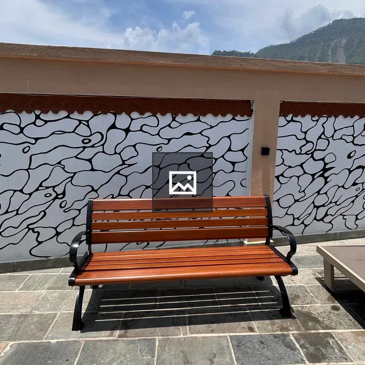 Wooden bench with black metal frame