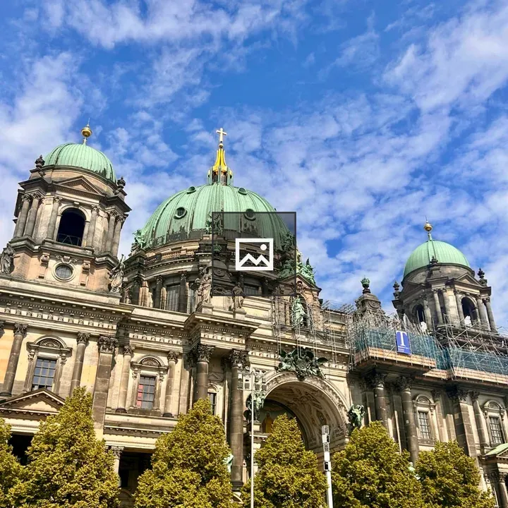 Church with Green Domes and Scaffolding